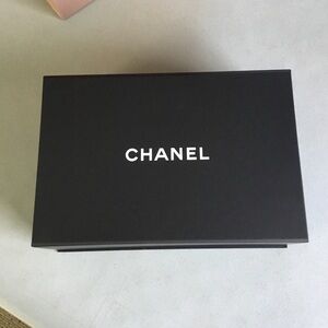 CHANEL EMPTY MAGNET BOX WITH SMALL DUST BAG AND BOOK.